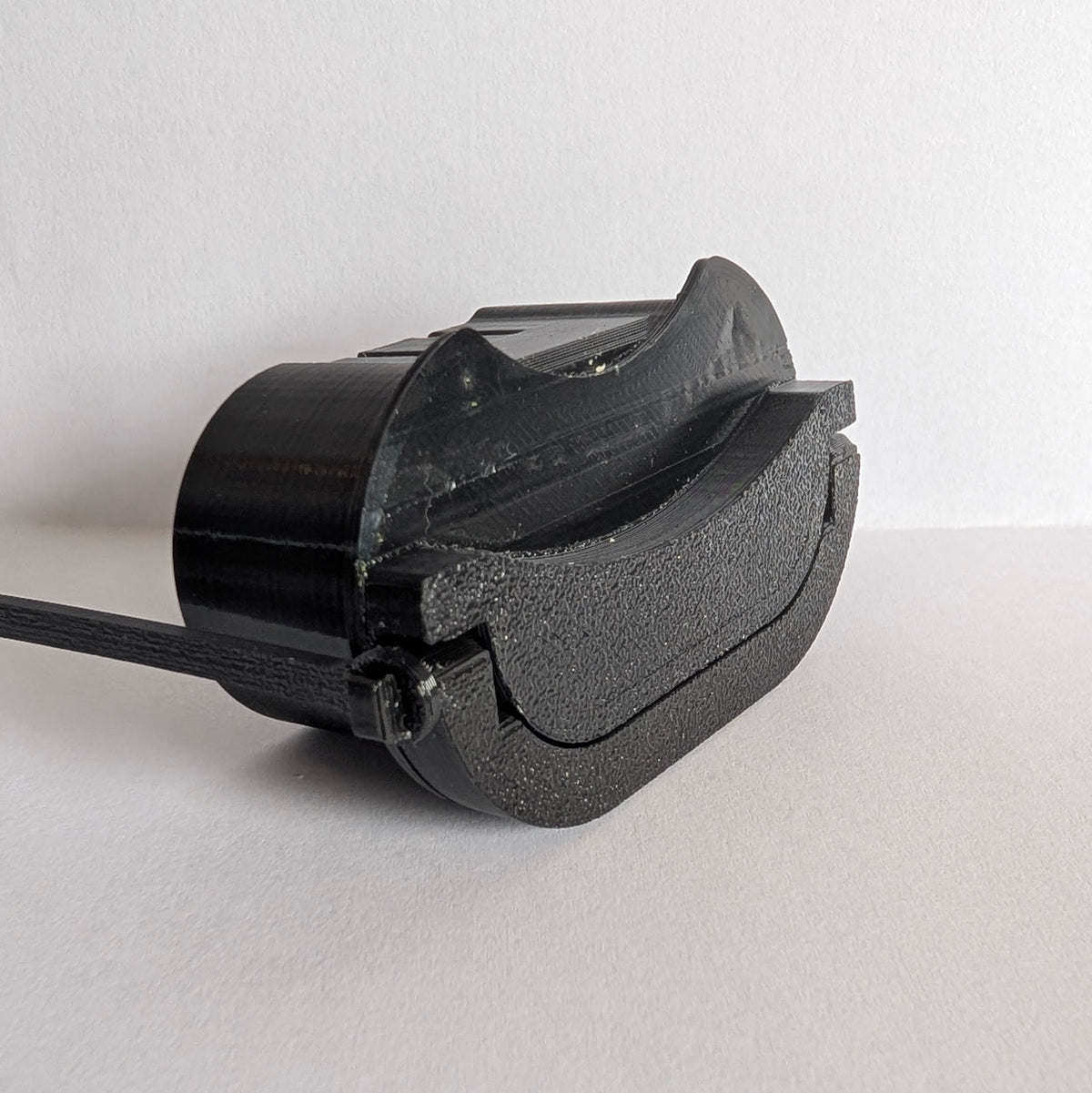 Electric vehicle charge port dust and moisture cover with low profile and swivel handle