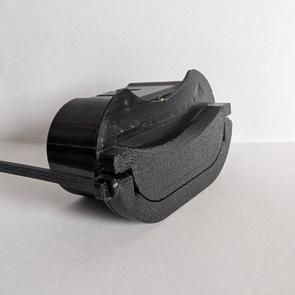 Electric vehicle charge port dust and moisture cover with low profile and swivel handle