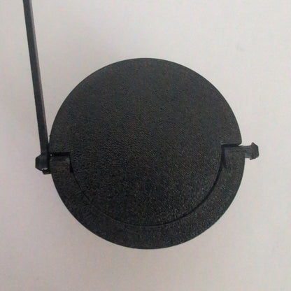 Electric vehicle charge port dust and moisture cover with low profile and swivel handle