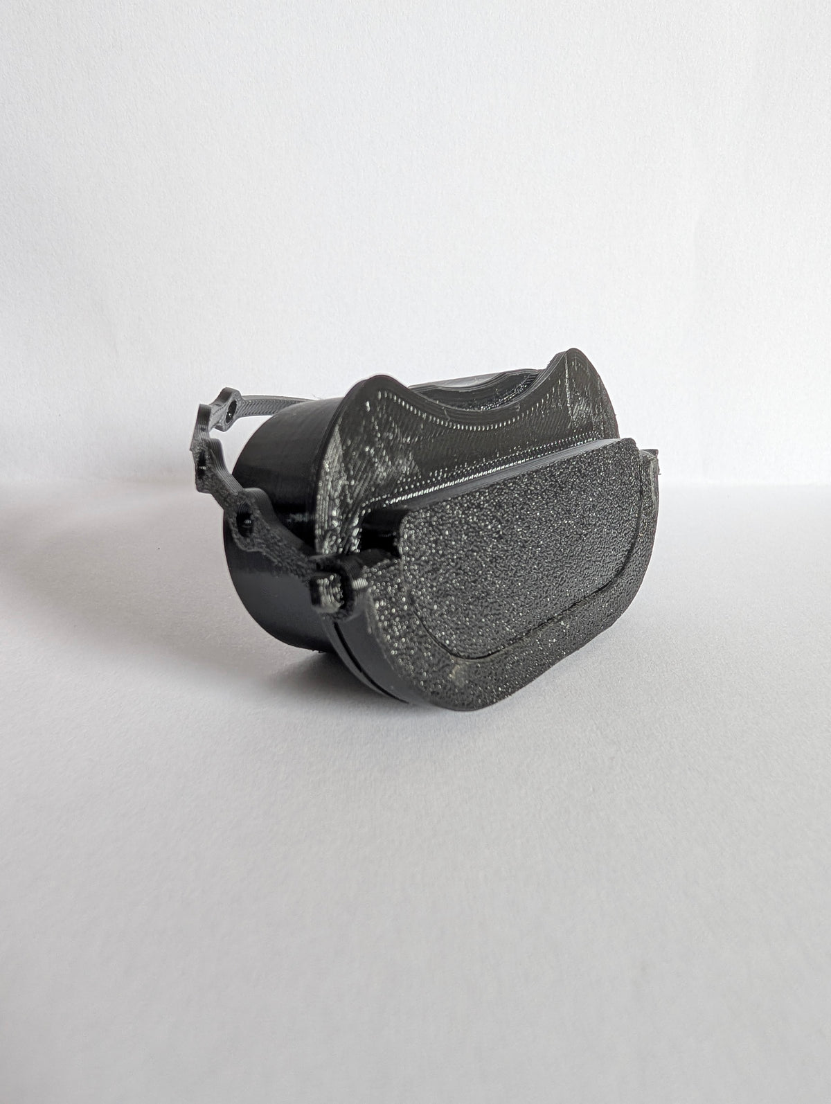 Electric vehicle charge port dust and moisture cover with low profile and swivel handle